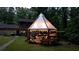 Backyard gazebo with lights and seating at 4567 Town Crier Sw Rd, Lilburn, GA 30047