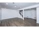 Spacious finished basement with wood-look floors and fireplace at 2371 Wingfoot Pl, Decatur, GA 30035