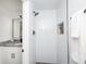 Clean bathroom with white subway tile, black accents, and a shower stall at 2371 Wingfoot Pl, Decatur, GA 30035