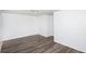 Bright and airy bedroom with neutral walls and wood-look floors at 2371 Wingfoot Pl, Decatur, GA 30035