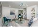 Bright living room features stylish furniture, a glass coffee table, and hardwood floors at 2371 Wingfoot Pl, Decatur, GA 30035