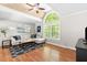 Bright living room with hardwood floors and vaulted ceiling at 135 River Point Ct, Alpharetta, GA 30022