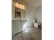 Bright bathroom featuring a toilet and vanity at 4201 Sturbridge Dr, Douglasville, GA 30135