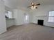 Spacious living room features a fireplace and vaulted ceiling at 4201 Sturbridge Dr, Douglasville, GA 30135