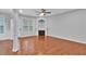 Living room boasts hardwood floors, fireplace, and natural light at 593 Woodland Park Ter, Lawrenceville, GA 30043