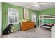 bedroom with bunk bed and cheerful green walls at 695 Arboreal Ct, Alpharetta, GA 30022