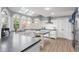 Spacious kitchen featuring an island, stainless steel appliances, and ample counter space at 695 Arboreal Ct, Alpharetta, GA 30022