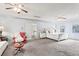 Bright and airy main bedroom with comfortable seating area at 695 Arboreal Ct, Alpharetta, GA 30022