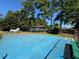 Blue basketball court with partial view of storage building at 4701 Flat Shoals Rd # 56E, Union City, GA 30291