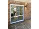 Sliding glass door leading to a patio from the brick home at 4701 Flat Shoals Rd # 56E, Union City, GA 30291