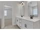 Modern bathroom with double vanity and access to bedroom at 3069 Shirecrest Lane, Dacula, GA 30019