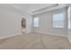 Main bedroom with trey ceiling, neutral walls, and carpet at 3069 Shirecrest Lane, Dacula, GA 30019