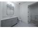 Bathroom with gray vanity and a toilet at 5271 Lake Forrest Dr, Atlanta, GA 30342