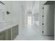 Luxury bathroom with marble floors and double vanity at 5271 Lake Forrest Dr, Atlanta, GA 30342