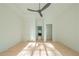 Light-filled bedroom with hardwood floors and doors at 5271 Lake Forrest Dr, Atlanta, GA 30342