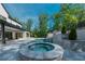 Relaxing hot tub with adjacent pool and patio at 5271 Lake Forrest Dr, Atlanta, GA 30342