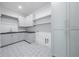 Bright laundry room with ample cabinetry and counter space at 5271 Lake Forrest Dr, Atlanta, GA 30342