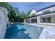 Inviting pool with adjacent spa and patio at 5271 Lake Forrest Dr, Atlanta, GA 30342