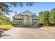Two-story townhome with green doors and parking at 9404 Cypress Ln, Jonesboro, GA 30238