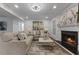 Living room with fireplace and hardwood floors at 9404 Cypress Ln, Jonesboro, GA 30238
