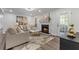 Spacious living room with fireplace and hardwood floors at 9404 Cypress Ln, Jonesboro, GA 30238
