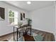 Home office with a desk, chair, and globe at 9404 Cypress Ln, Jonesboro, GA 30238