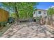 Spacious back deck with seating area, grill, and partial view of the house at 1042 Saint Charles Ne Ave # 1042-7, Atlanta, GA 30306