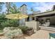 Outdoor space features a built in grilling station, lounging furniture, and garden at 3612 Castlegate Nw Dr, Atlanta, GA 30327