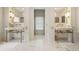 Elegant bathroom with marble countertops, stylish fixtures, and ample storage, offering a luxurious experience at 3612 Castlegate Nw Dr, Atlanta, GA 30327