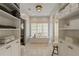 Luxurious bathroom with a freestanding tub, modern fixtures, and ample cabinet space, creating a spa-like experience at 3612 Castlegate Nw Dr, Atlanta, GA 30327