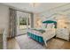 Calming bedroom with soothing colors, muraled walls, a plush bed, and soft lighting from bedside lamps at 3612 Castlegate Nw Dr, Atlanta, GA 30327