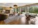 Living room features a decorative fireplace, large doors, and stylish decor for an inviting and sophisticated atmosphere at 3612 Castlegate Nw Dr, Atlanta, GA 30327