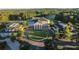 Aerial view of the club house with a circular drive in the middle of two golf courses at 4927 Slaton Drive, Acworth, GA 30101