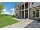 Spacious backyard features a stone patio and a lush green lawn with room to entertain at 4927 Slaton Drive, Acworth, GA 30101