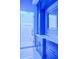 Modern bathroom showcasing a glass-enclosed shower and sleek blue cabinetry, creating a spa-like retreat at 4927 Slaton Drive, Acworth, GA 30101