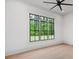 A bright bedroom with big windows offers natural light, creating a serene and inviting atmosphere for relaxation at 4927 Slaton Drive, Acworth, GA 30101
