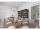 Bright dining area with large window and hardwood floors provides a modern and inviting space at 4927 Slaton Drive, Acworth, GA 30101