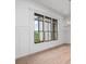 Bright dining area with large window and hardwood floors provides a modern and inviting space at 4927 Slaton Drive, Acworth, GA 30101