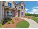 Beautiful front entrance with a stone walkway and manicured landscaping at 4927 Slaton Drive, Acworth, GA 30101