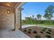Front porch with stone floor and view of the landscaped front yard at 4927 Slaton Drive, Acworth, GA 30101