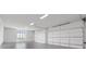 Spacious four-car garage with ample room for parking and storage featuring natural light at 4927 Slaton Drive, Acworth, GA 30101