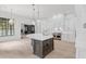 Spacious kitchen with a large island, stainless steel appliances, and hardwood floors at 4927 Slaton Drive, Acworth, GA 30101