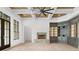Bright living room with coffered ceiling, fireplace, hardwood floors and custom built-ins at 4927 Slaton Drive, Acworth, GA 30101