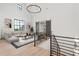 Open living room with vaulted ceilings, shiplap walls, and a large window with bright, natural light at 4927 Slaton Drive, Acworth, GA 30101