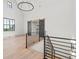 Open living area with vaulted ceiling, shiplap walls, and a modern chandelier at 4927 Slaton Drive, Acworth, GA 30101