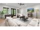 Cozy living room featuring a comfortable sofa, foosball table, and bar area at 4927 Slaton Drive, Acworth, GA 30101