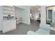 Comfortable lounge area with plush seating, cabinets and shelving offering relaxing spa atmosphere at 4927 Slaton Drive, Acworth, GA 30101