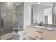 Modern main bathroom featuring a glass-enclosed shower with herringbone tile and a stylish vanity with elegant fixtures at 4927 Slaton Drive, Acworth, GA 30101