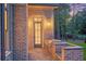 Stylish outdoor kitchen with modern appliances and stone countertops at 4927 Slaton Drive, Acworth, GA 30101