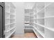 Spacious walk-in pantry with floor-to-ceiling shelving offering ample storage at 4927 Slaton Drive, Acworth, GA 30101